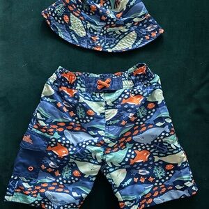 Skinz Boys Blue Swim Shorts with Orange Accents